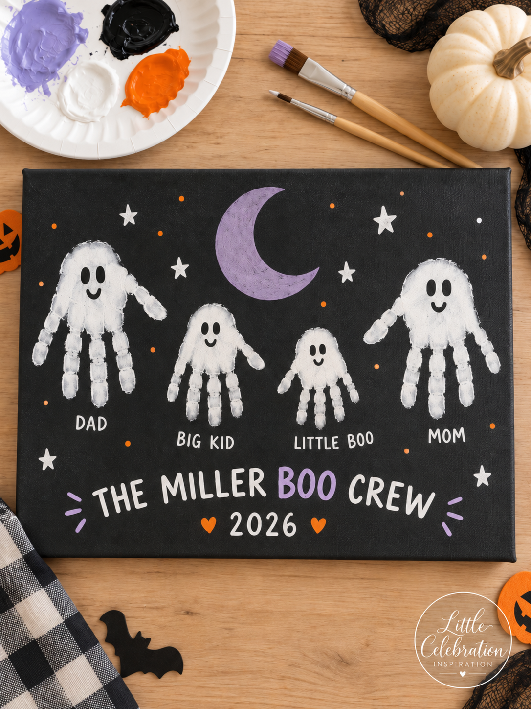 Black family Halloween canvas with four white handprint ghosts labeled Dad, Big Kid, Little Boo, and Mom.