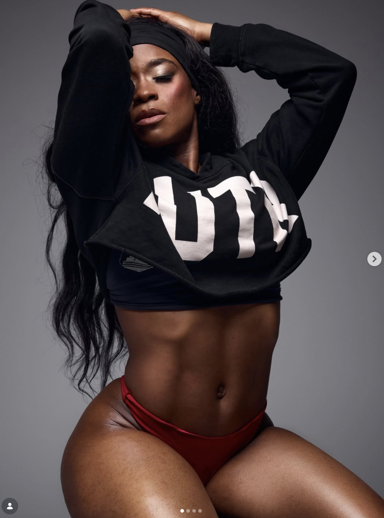 Tally Body founder in a cropped hoodie, showing the conditioning built over a full building phase