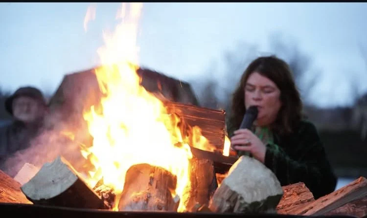 Ceremony with the Dingle Druid beside a large-scale woven willow Cailleach sculpture by Kerry artist Phil McSweeney at Tralee Bay Wetlands