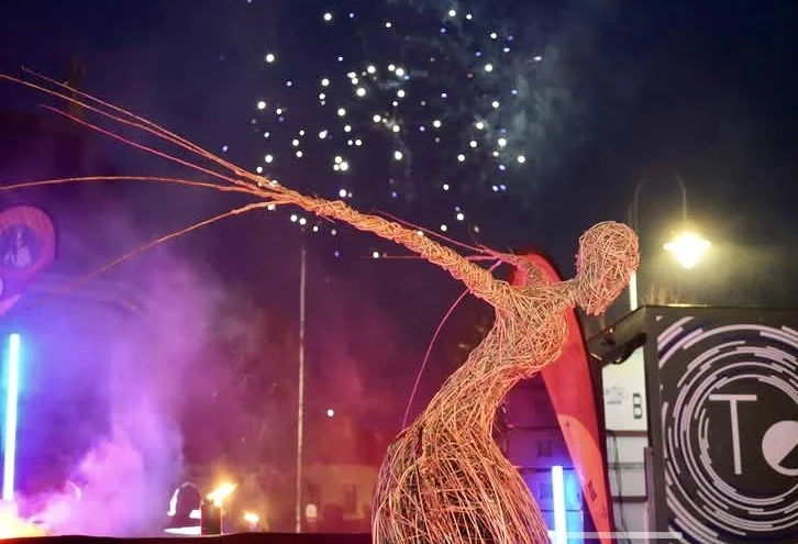 Fire and light ceremony beside a large-scale woven willow Cailleach sculpture by Kerry artist Phil McSweeney in Listowel