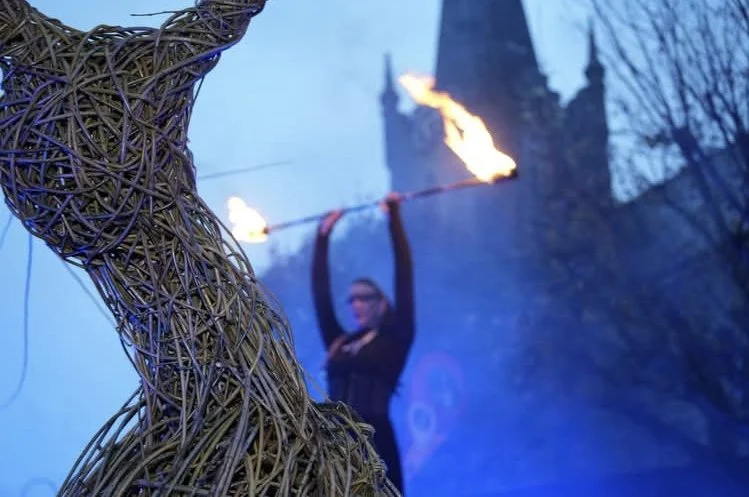Fire and light ceremony beside a large-scale woven willow Cailleach sculpture by Kerry artist Phil McSweeney in Listowel