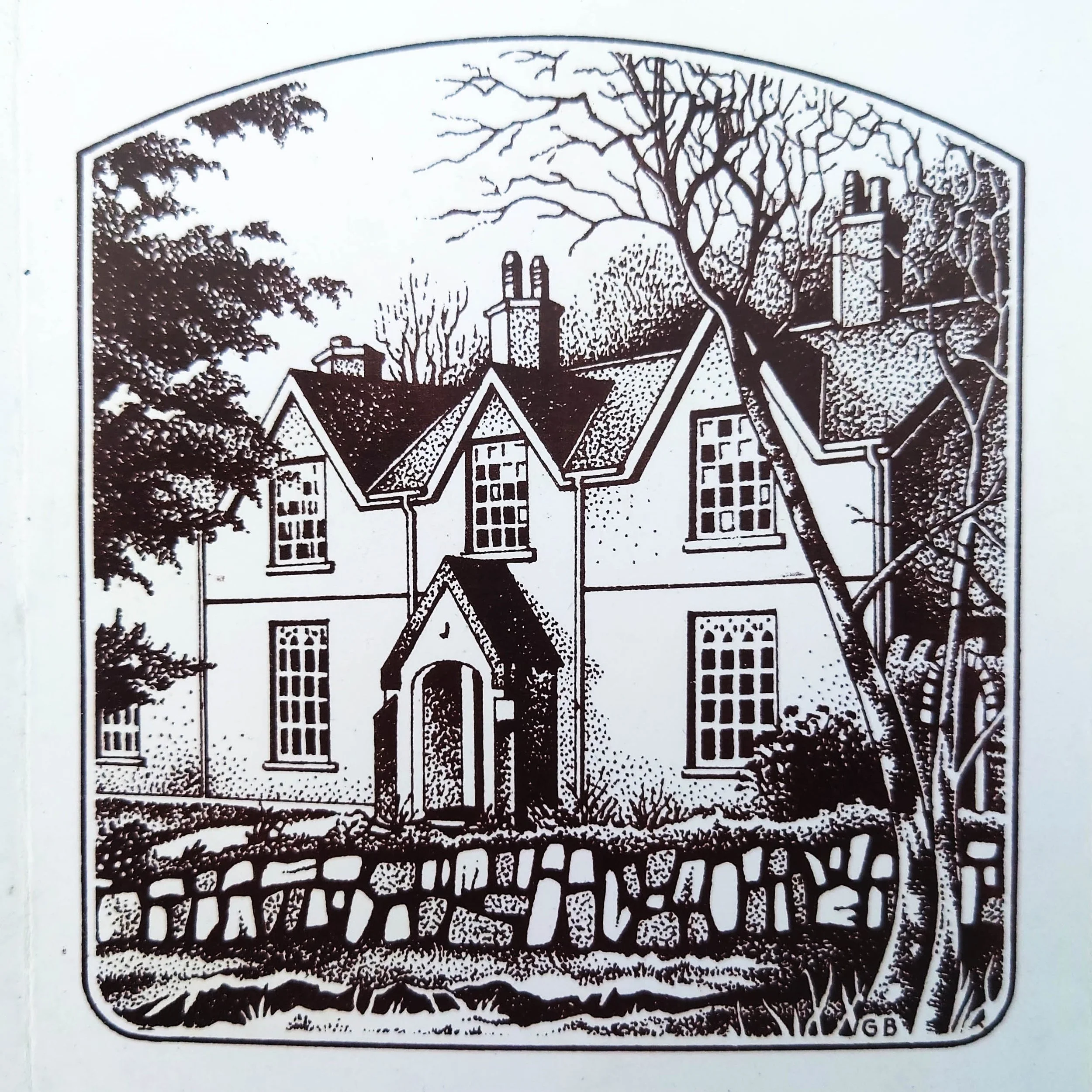 A detailed black and white paper cutout illustration of a house with a pointed roof, surrounded by trees, with a decorative border and the word 'YARD' on it.
