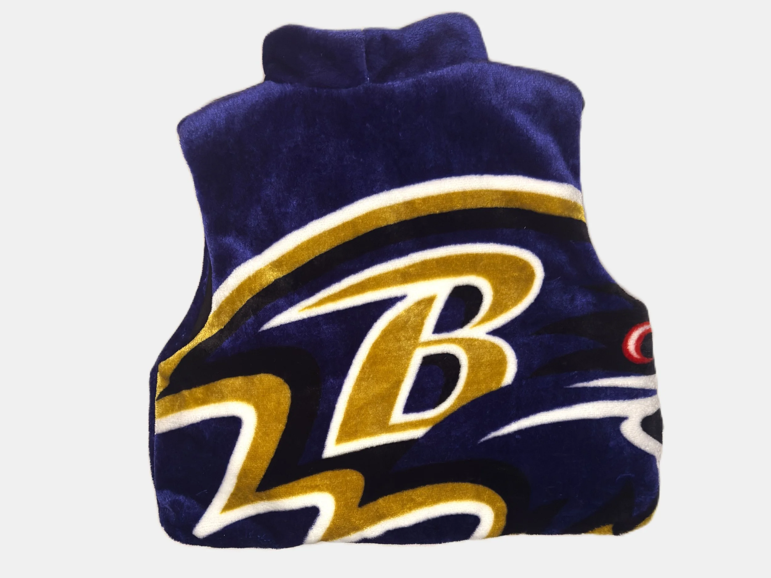 Close-up of a plush towel featuring a sports team logo with navy blue, gold, black, and white colors.