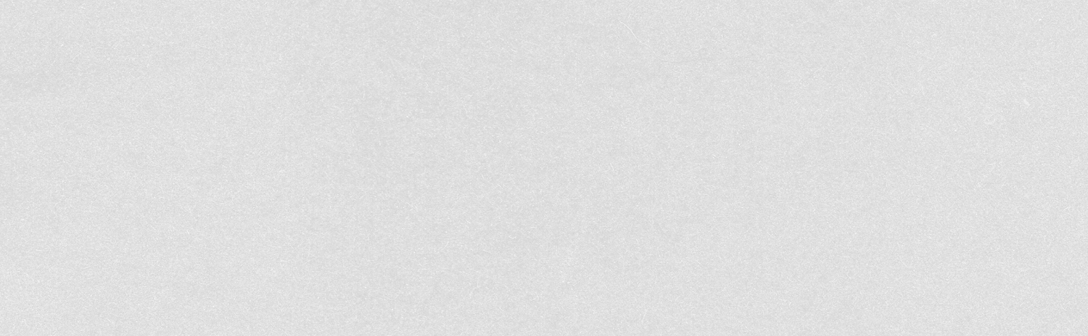 Gray textured surface resembling asphalt or concrete