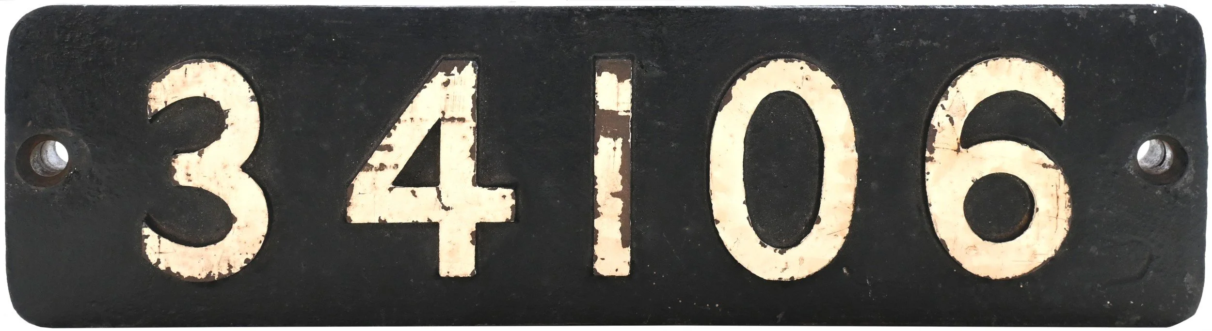 Locomotive Smokebox Numberplate 34106, showing chipped and worn paint.