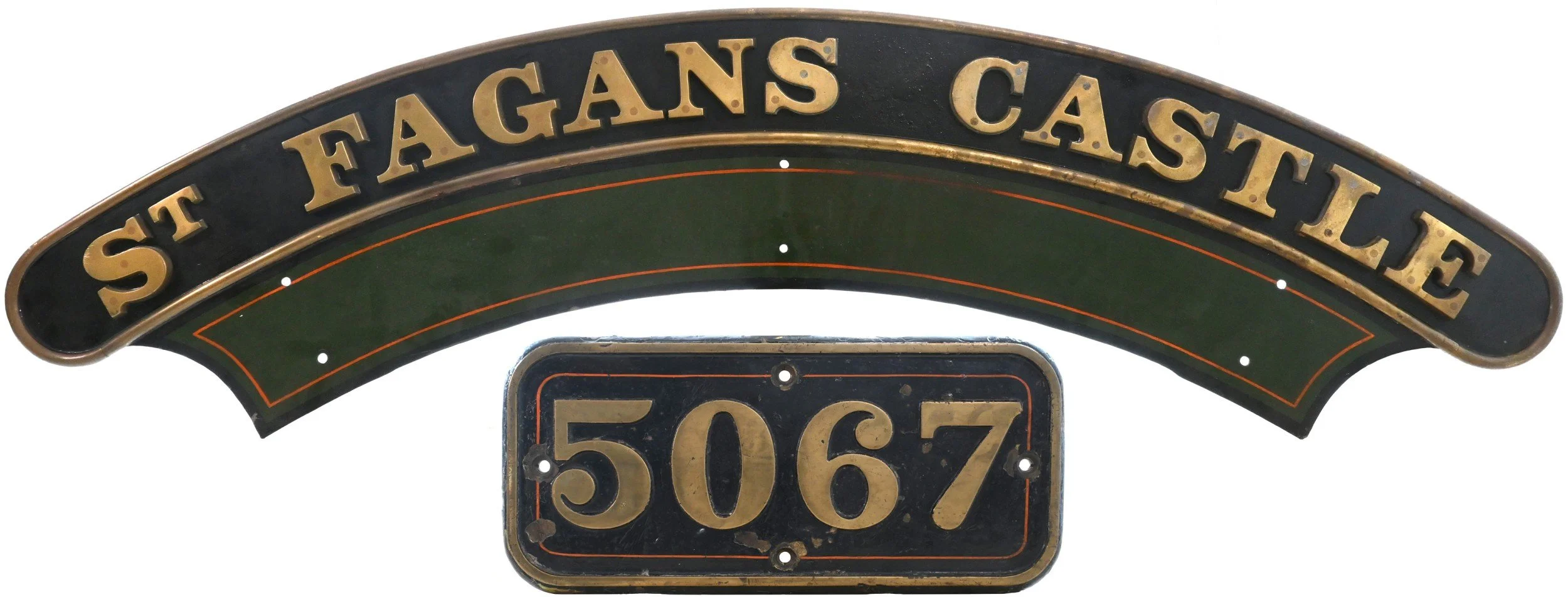 Vintage metal sign with black background and gold lettering reading "St. Fagans Castle" and a smaller sign below with the number "5067".