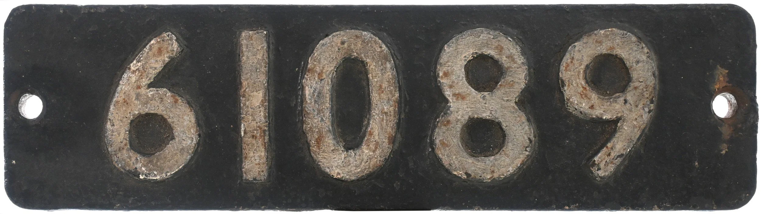 Locomotive Smokebox Numberplate 61089, weathered and rusted, with two hole mounting points on each side.