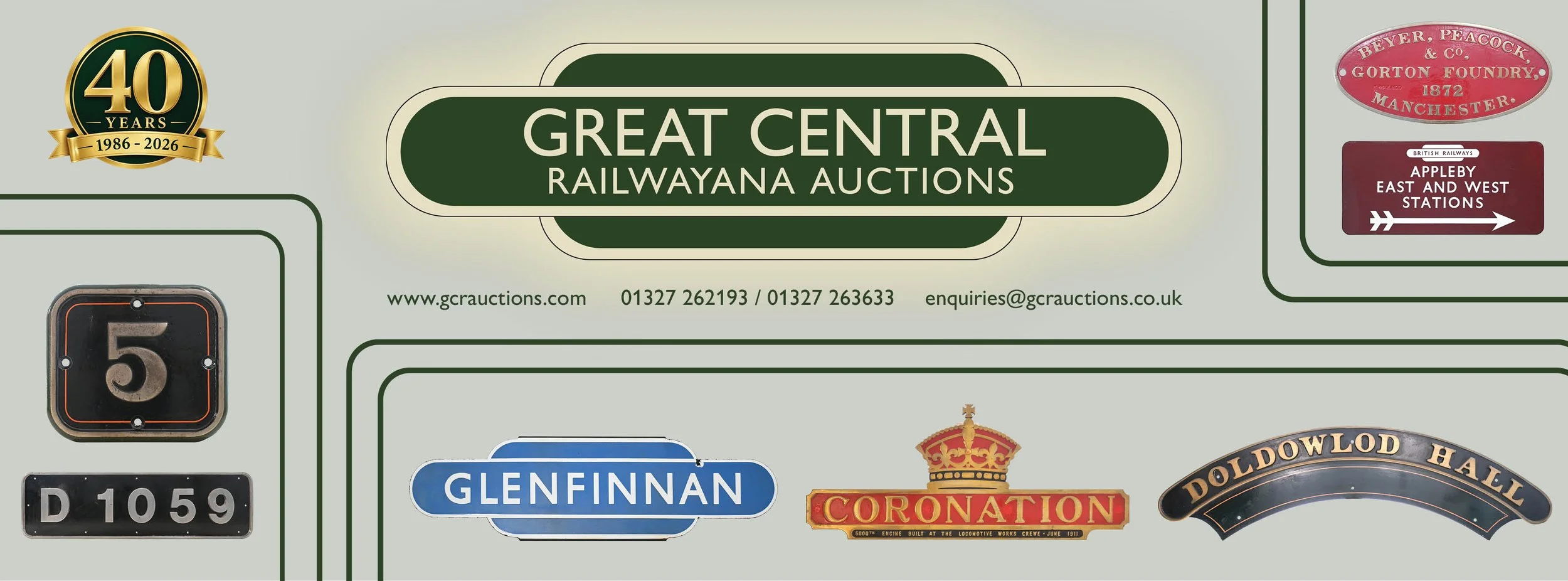Signboard for Great Central Railwayana Auctions with logos and directional signs for stations and railways, celebrating 40 years from 1986 to 2026.