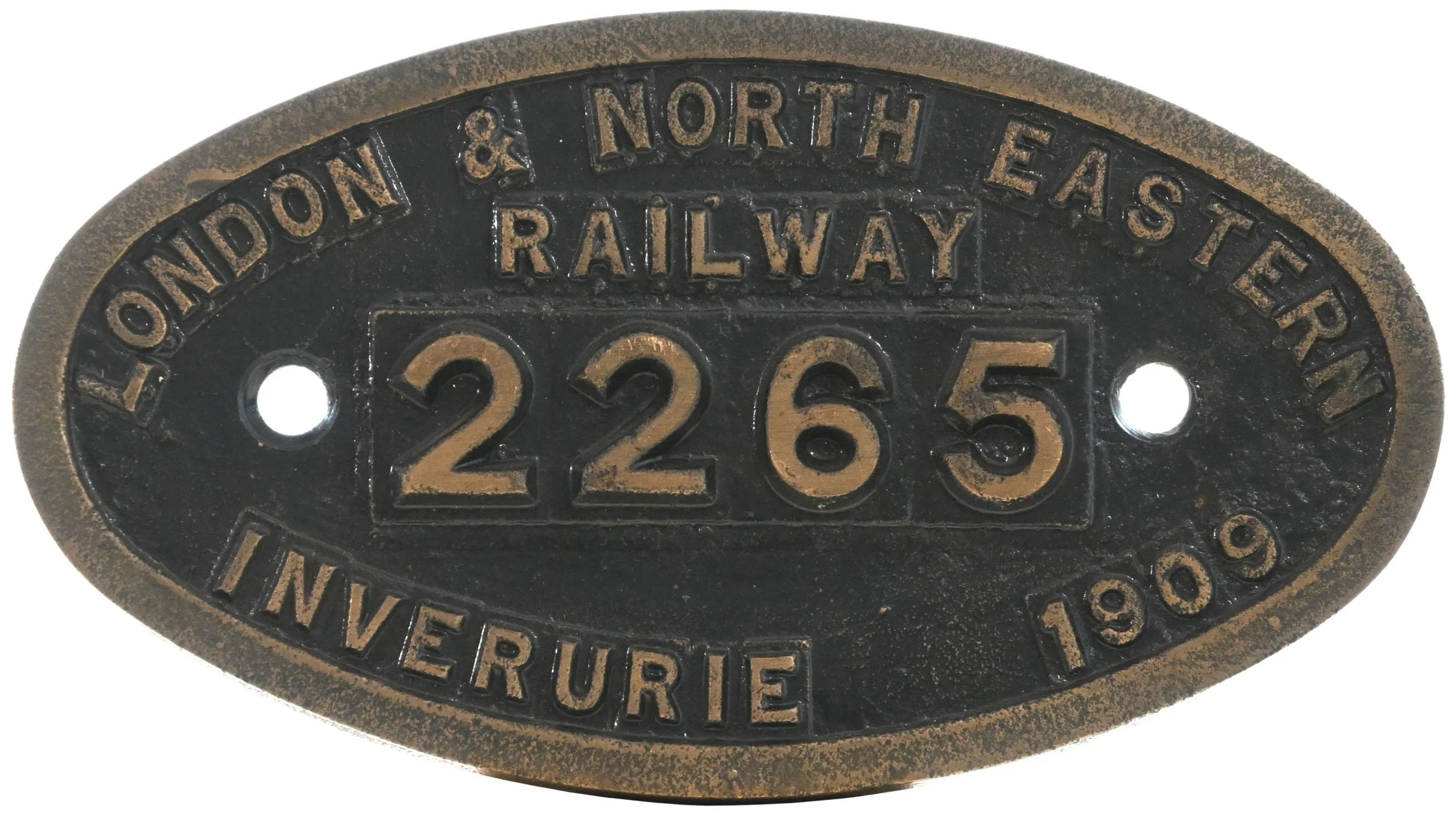 Oval metal railway worksplate with raised text indicating 'Ontario & North East Railway 2263 Inverurie 1908'.