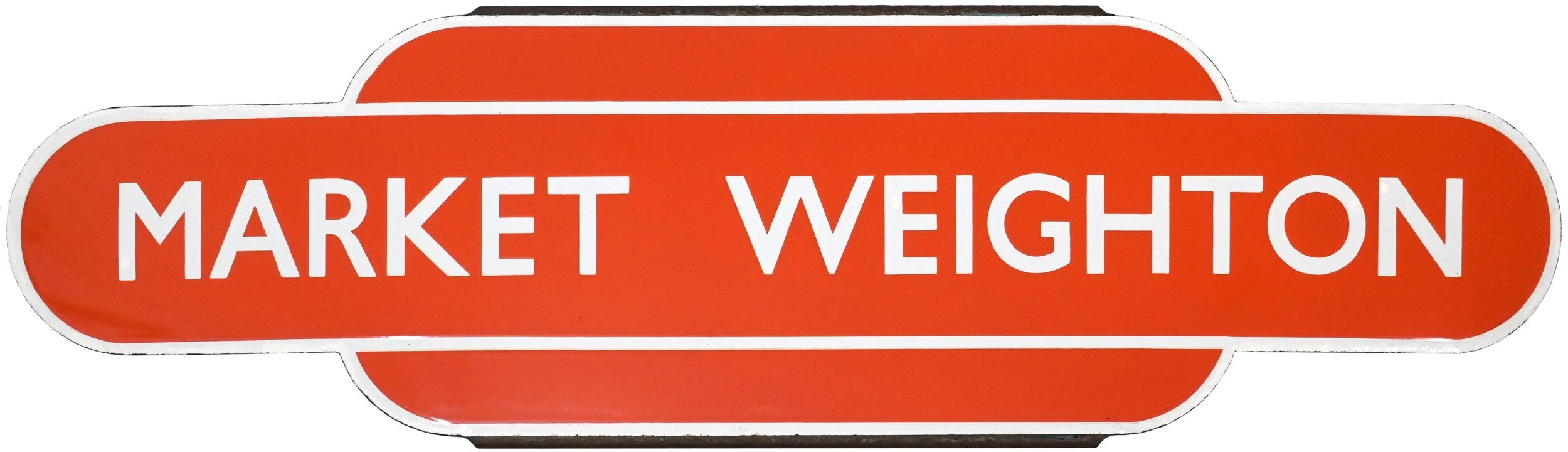 A railway station Totem 'Market Wexton' written in white capital letters, with a horizontal elongated oval shape and a rounded top and bottom.