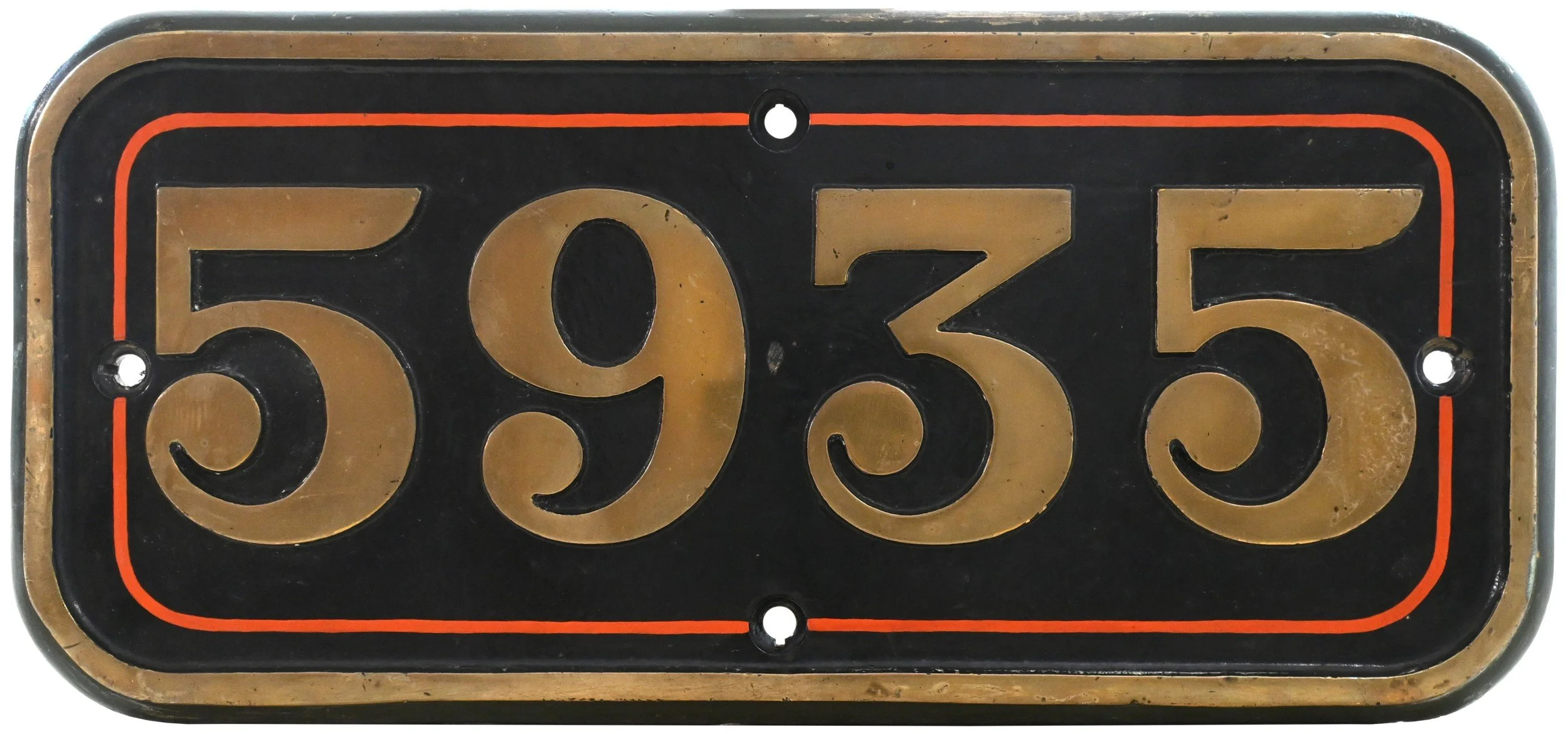 Close-up of a GWR Cabside numberplate with the number '5935' in large gold lettering on a black background, outlined with an orange border, and four screw holes for mounting.