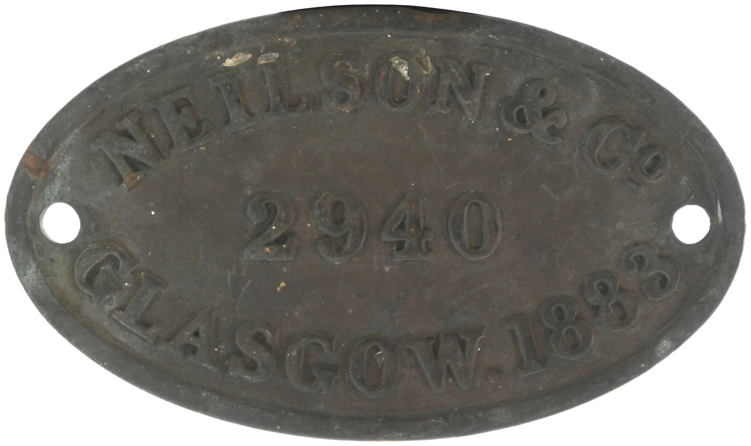Oval metal identification plate with embossed text reading 'N. T. LILSON CO. 2940'