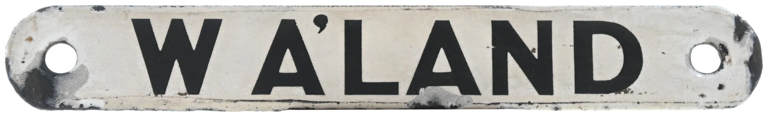 Enamel shedplate with black lettering that reads "WALAND" with two holes for mounting on each side.