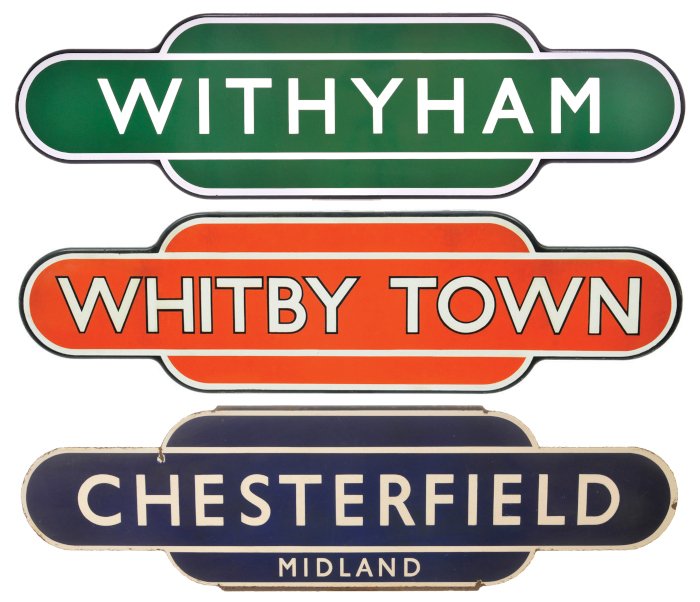 Three vintage street sign plates with place names: WITHYHAM in green, WHITBY TOWN in orange, and CHESTERFIELD MIDLAND in dark blue.