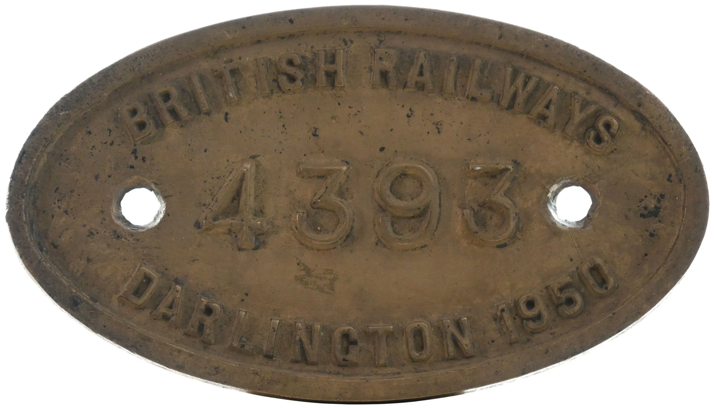 Oval metal tag with embossed text reading 'BRITISH RAILWAYS' and the number '439' in the center, with two holes on either side for attachment, aged and slightly rusted.