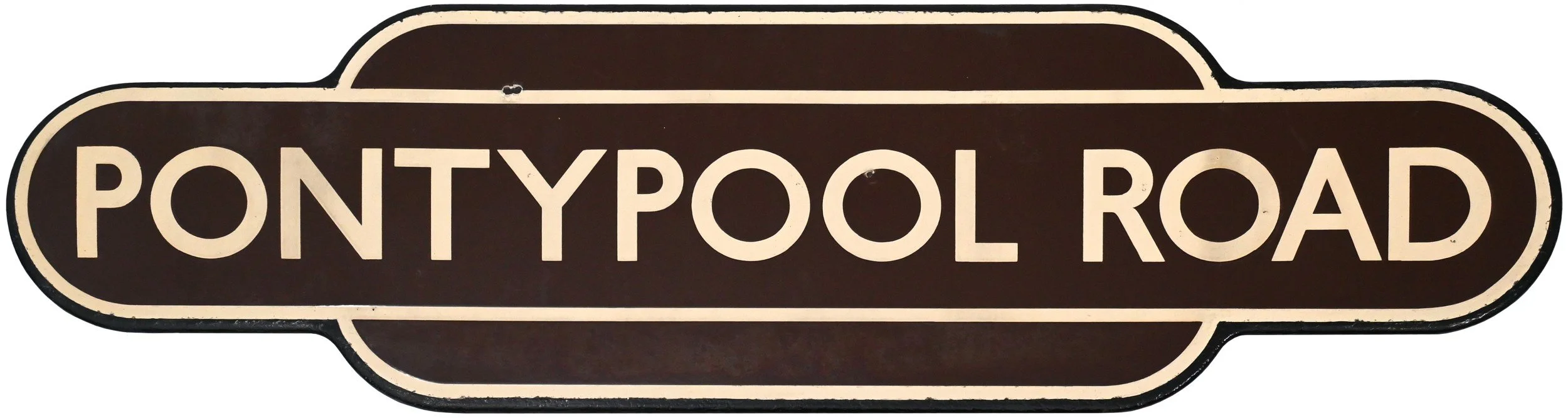 railway station Totem sign for Pontypool Road in a vintage style with a dark brown background and cream-colored border and lettering.
