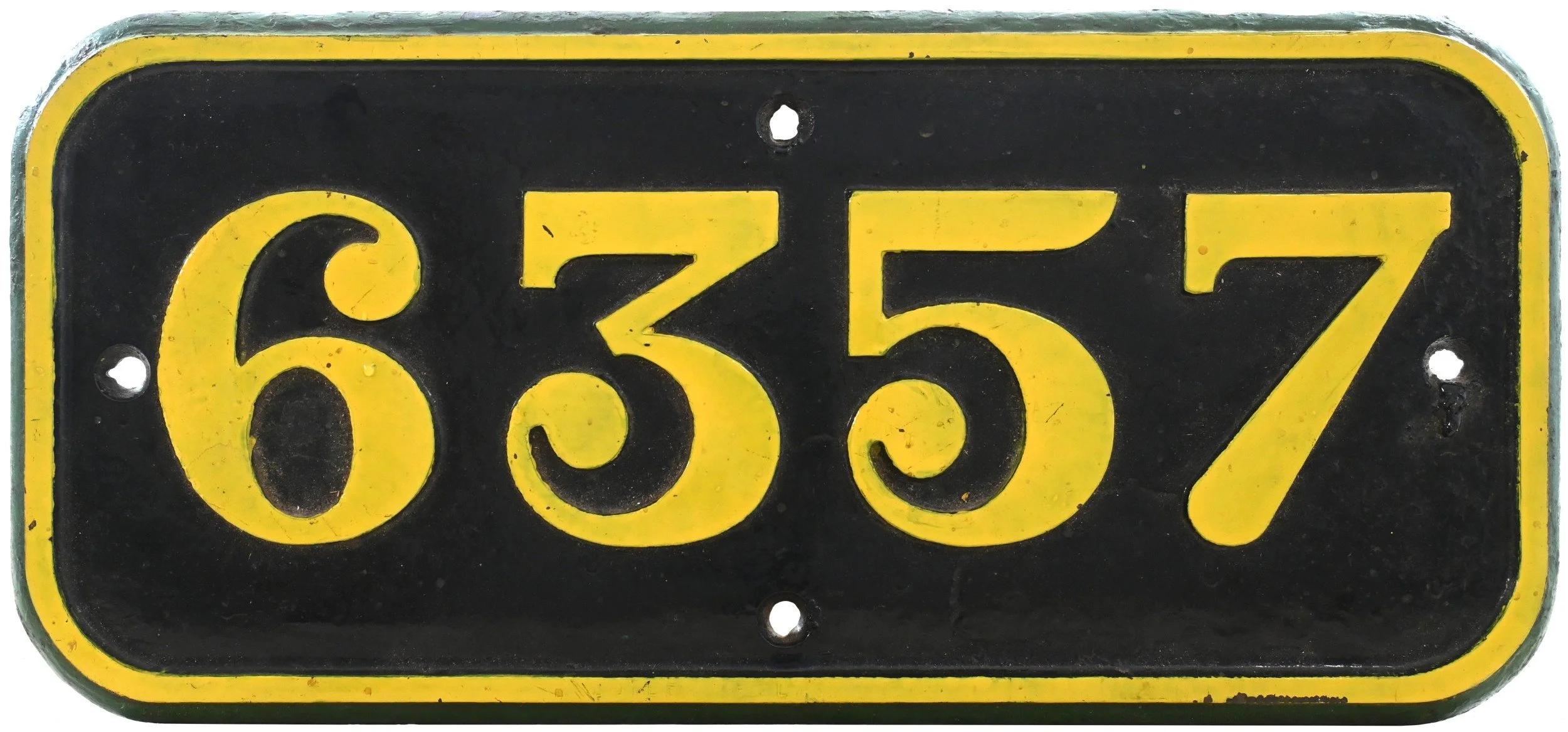GWR Cabside numberplate with the number '6357' written in bold yellow characters.