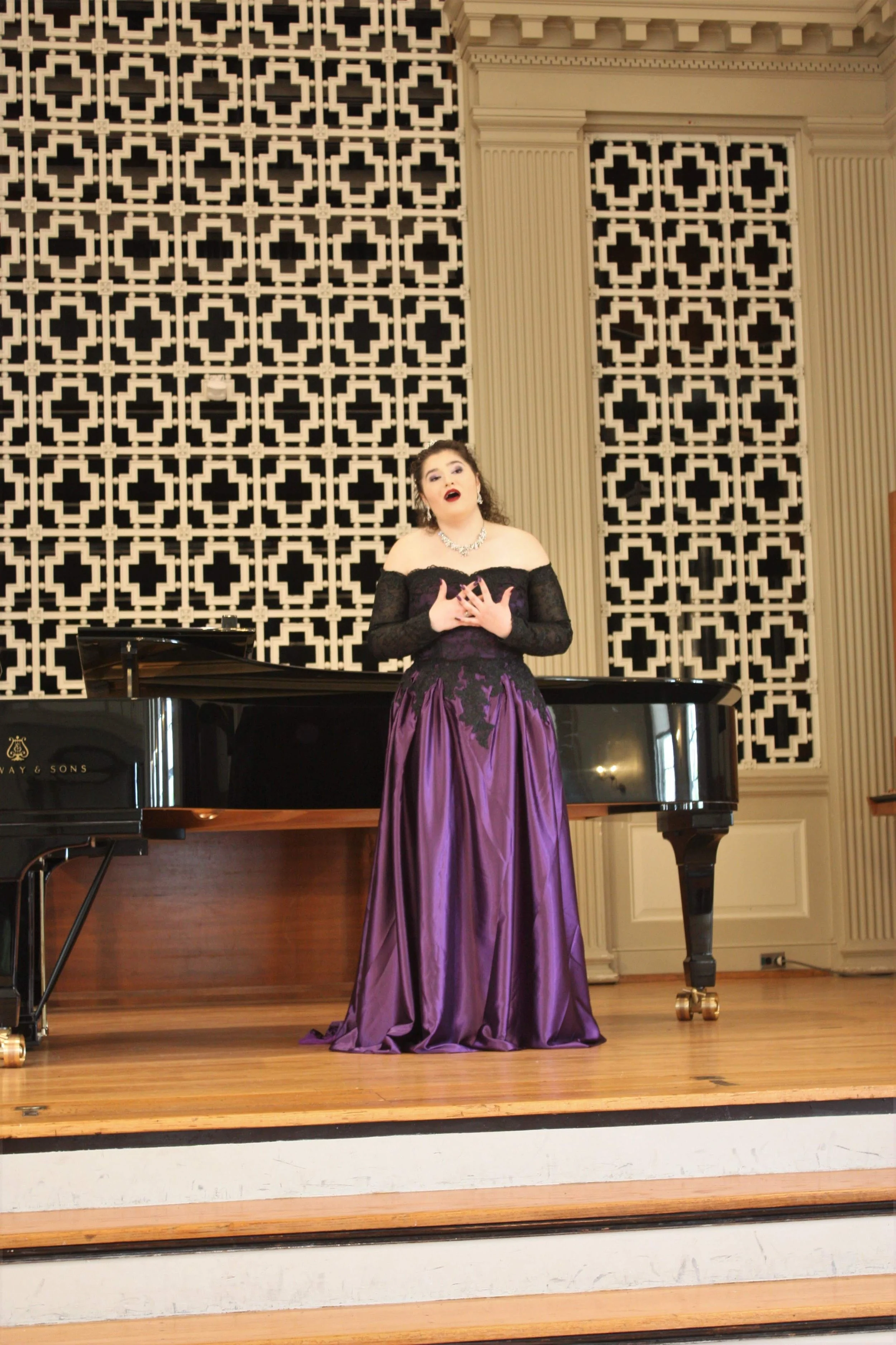 Amy Brandt performing at a recital. Founder and teacher at Brandt Voice Studio.