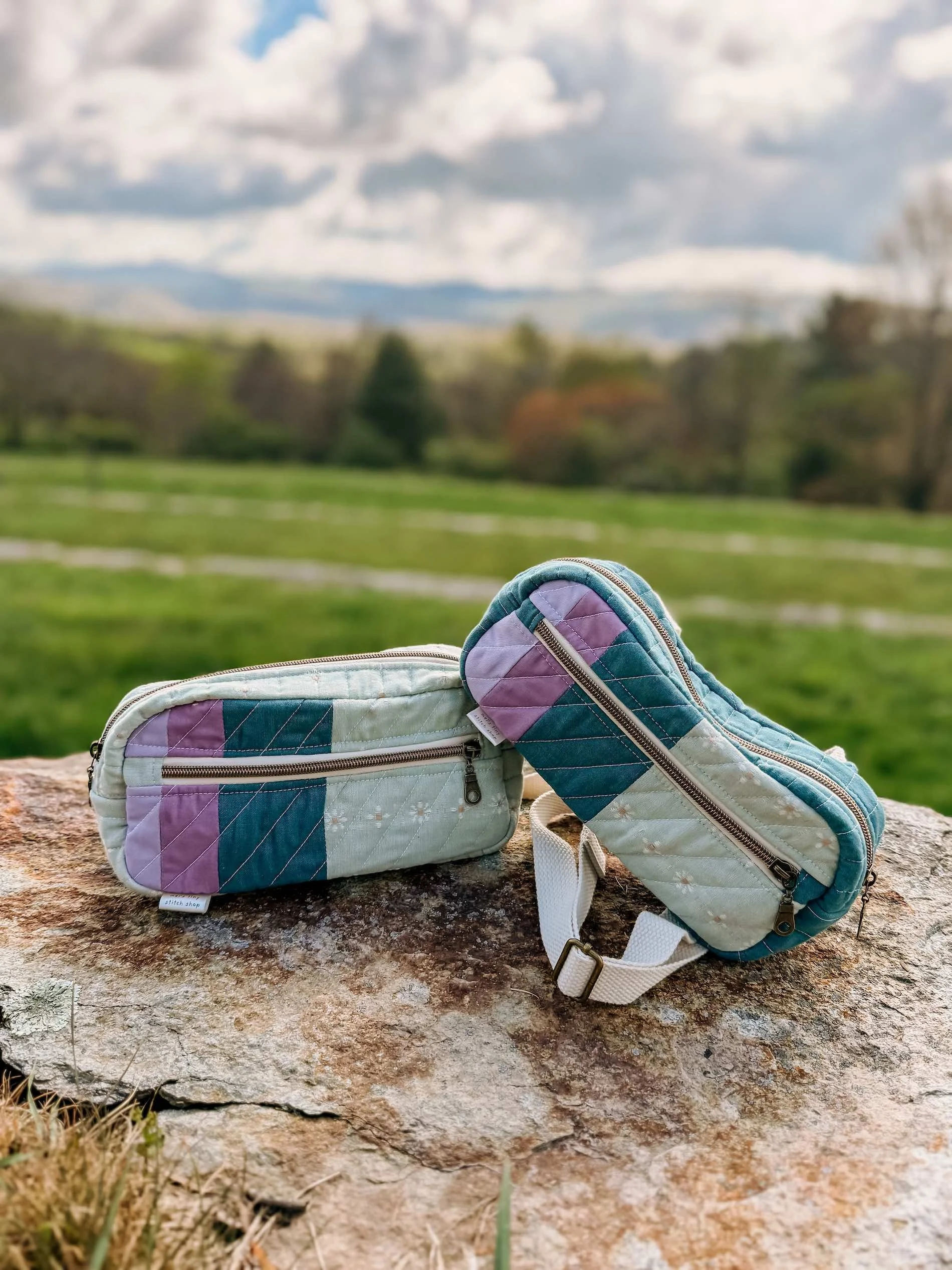 Two quilted cross-body bags sewn by Melanie Covington in north carolina