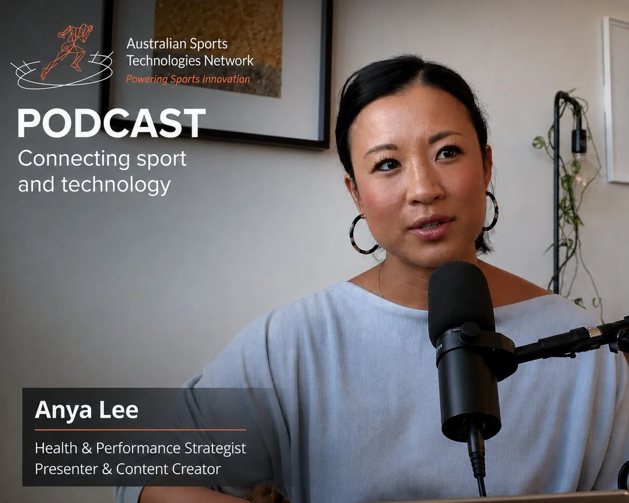 A woman with dark hair and hoop earrings speaking into a microphone during a podcast interview in an indoor setting with a plant in the background. Text overlays identify her as Anya Lee, a health and performance strategist, and content creator, with the podcast titled 'Connecting sport and technology' by the Australian Sports Technologies Network.