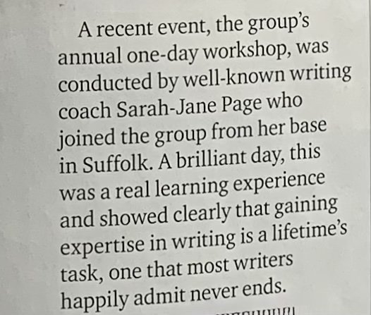 Close-up of printed text from a book or article discussing a writing workshop led by Sarah-Jane Page in Suffolk.