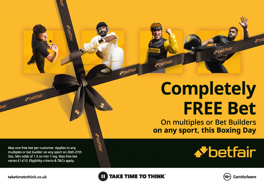 Advertisement for Betfair offering a fully free bet on any sport on Boxing Day, featuring images of four athletes including a boxer, a cricket player, and a football player, with a yellow background and black bow detail.