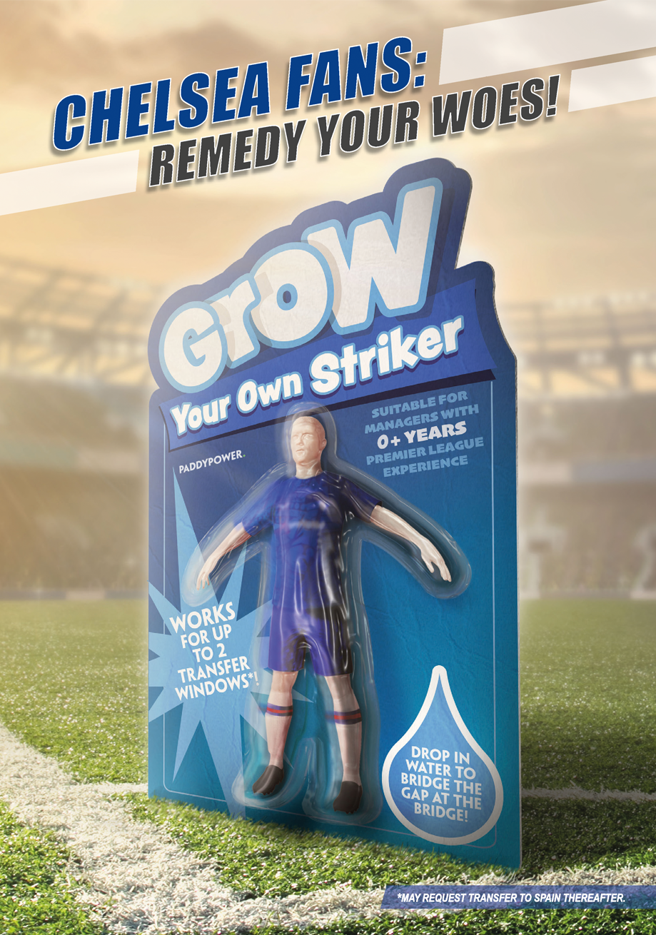 A toy figurine of a football player in a blue uniform with black shoes and striped socks, attached to a blue and white blister pack with text about Chelsea fans and a humorous depiction of a 'DIY striker' for managers.
