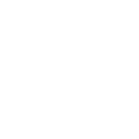 Two people sitting at a table engaged in conversation with speech bubbles above their heads.