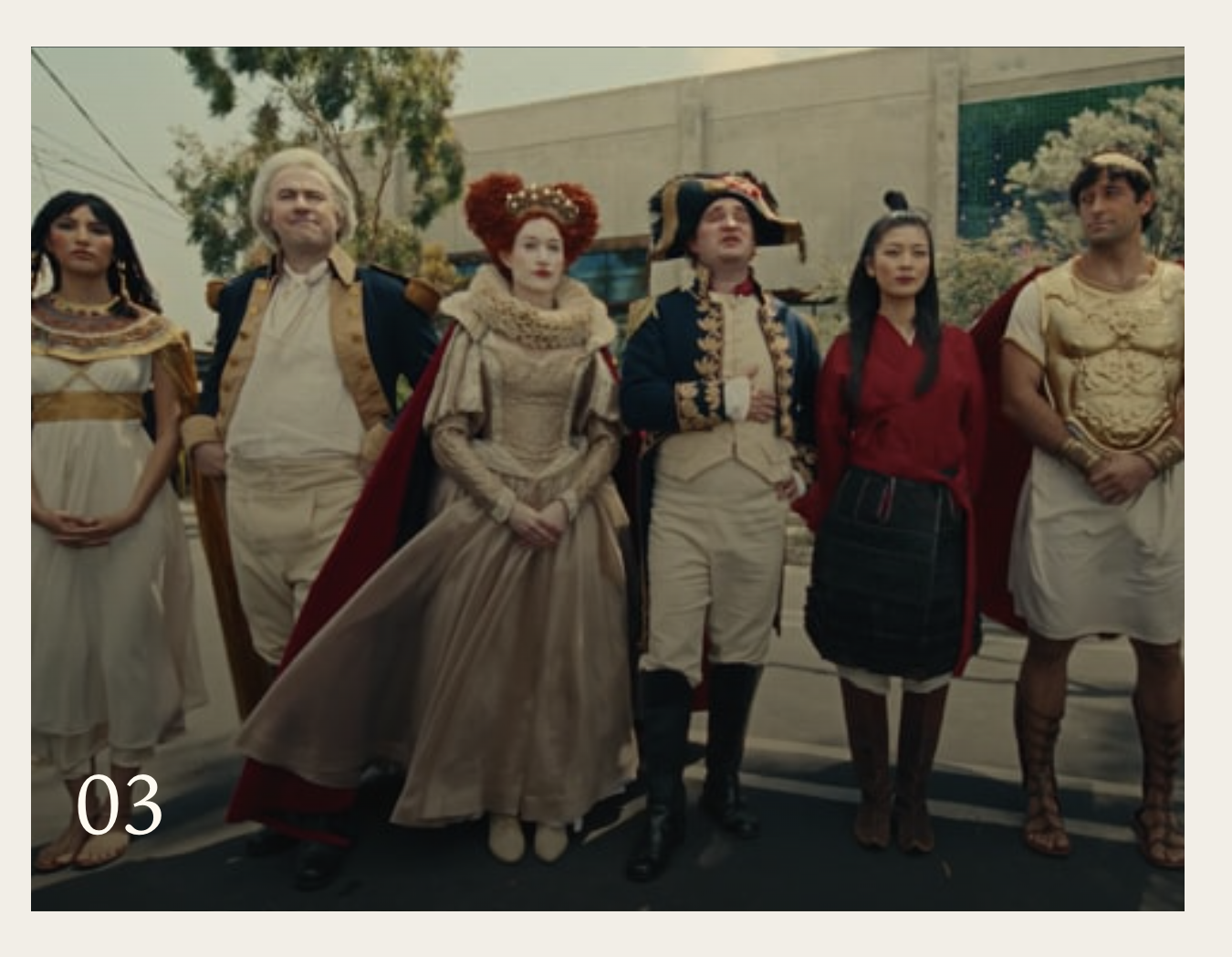 Six performers dressed as historical leaders stand together in the Civilization: Eras & Allies commercial.