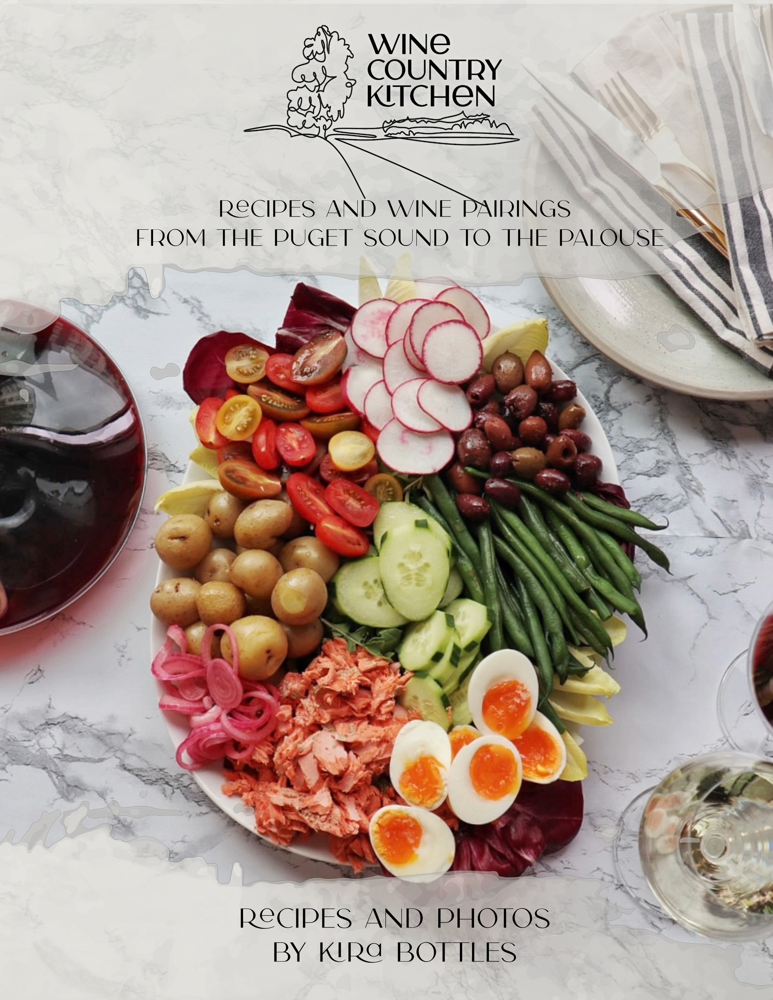 Wine and Nicoise Salad on a marble backdrop book cover