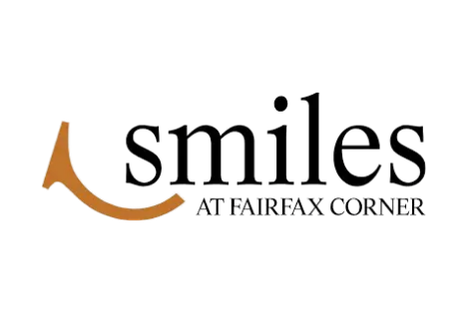 The Smiles at the Tonik logo with a stylized smile in orange to the left of the text.