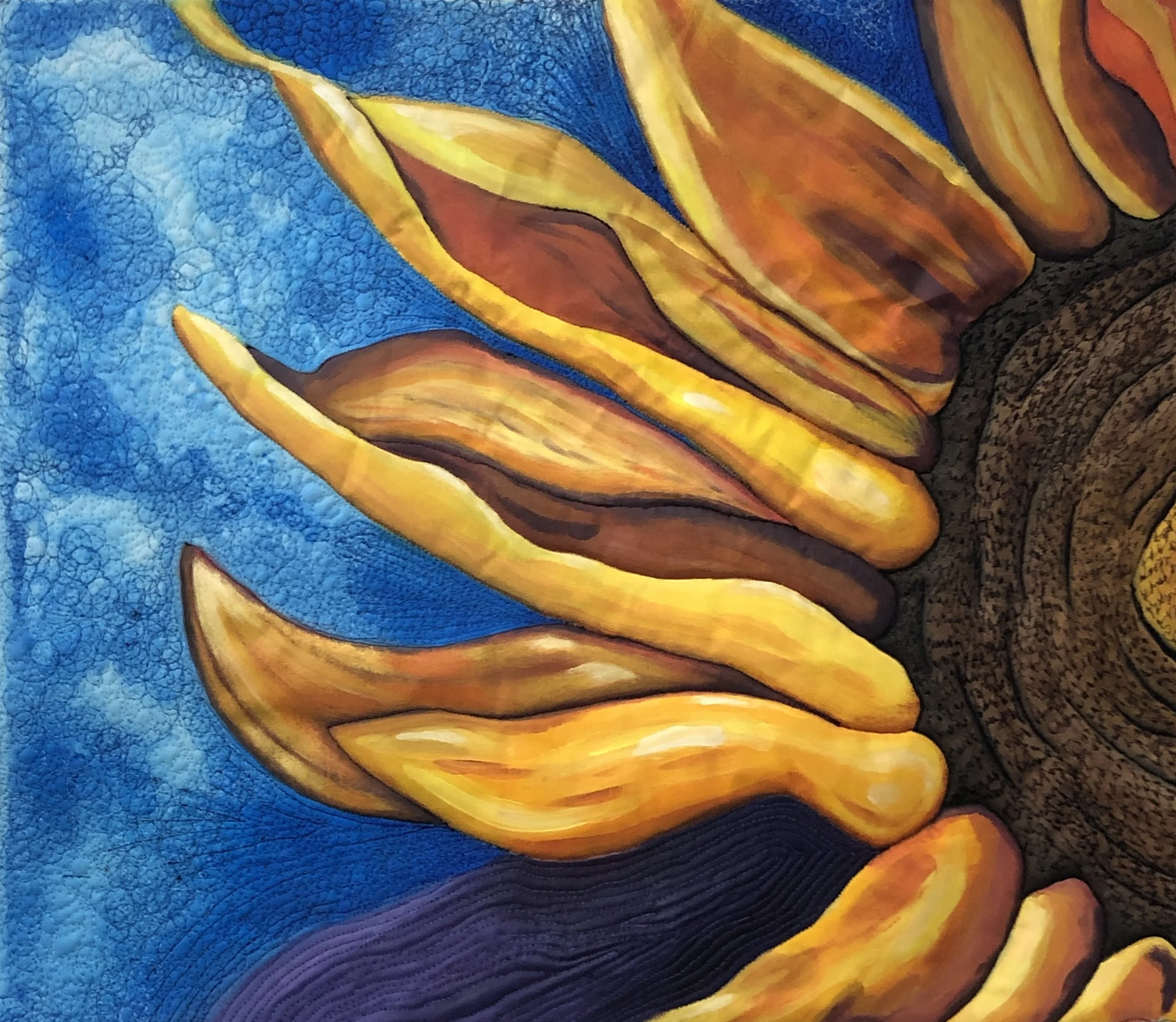 Close-up of a colorful abstract painting featuring flowing lines and textured blue background with orange, yellow, and red accents.