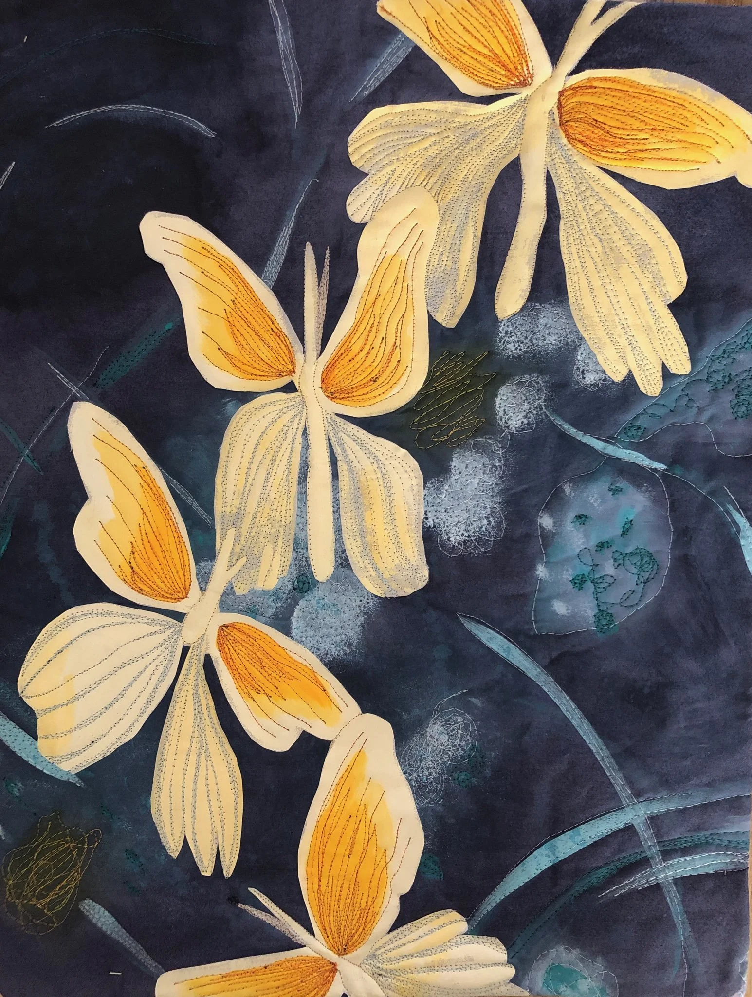 HIDDEN FLOWERS — Golden flowers emerge from a rich, shadowy background, inviting viewers to notice the beauty that can quietly appear in unexpected places. Award: 2023 Fabric Challenge, Franklin Park Arts Center, Purcellville, Virginia — Honorable Me
