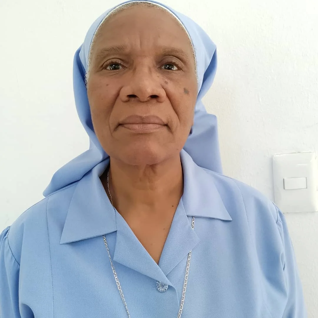 Sr Jacqueline Louissaint serves as the Mission Director for the Little Sisters Savanette Mission. In this leadership role, she oversees the mission's spiritual programs, community outreach initiatives, and daily administrative operations, dedication 