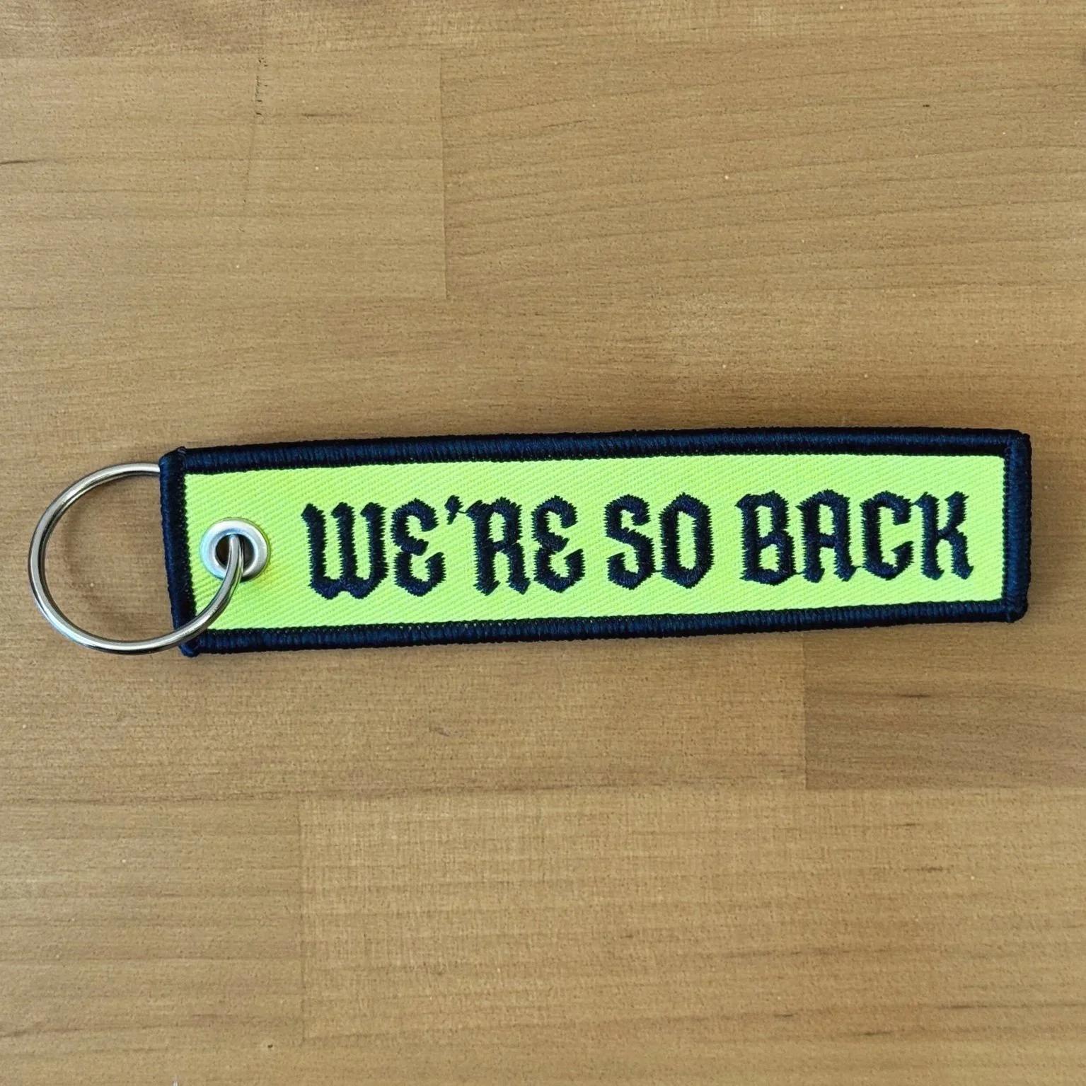 Keychain+Green+and+black+we%27re+so+back+front.jpg
