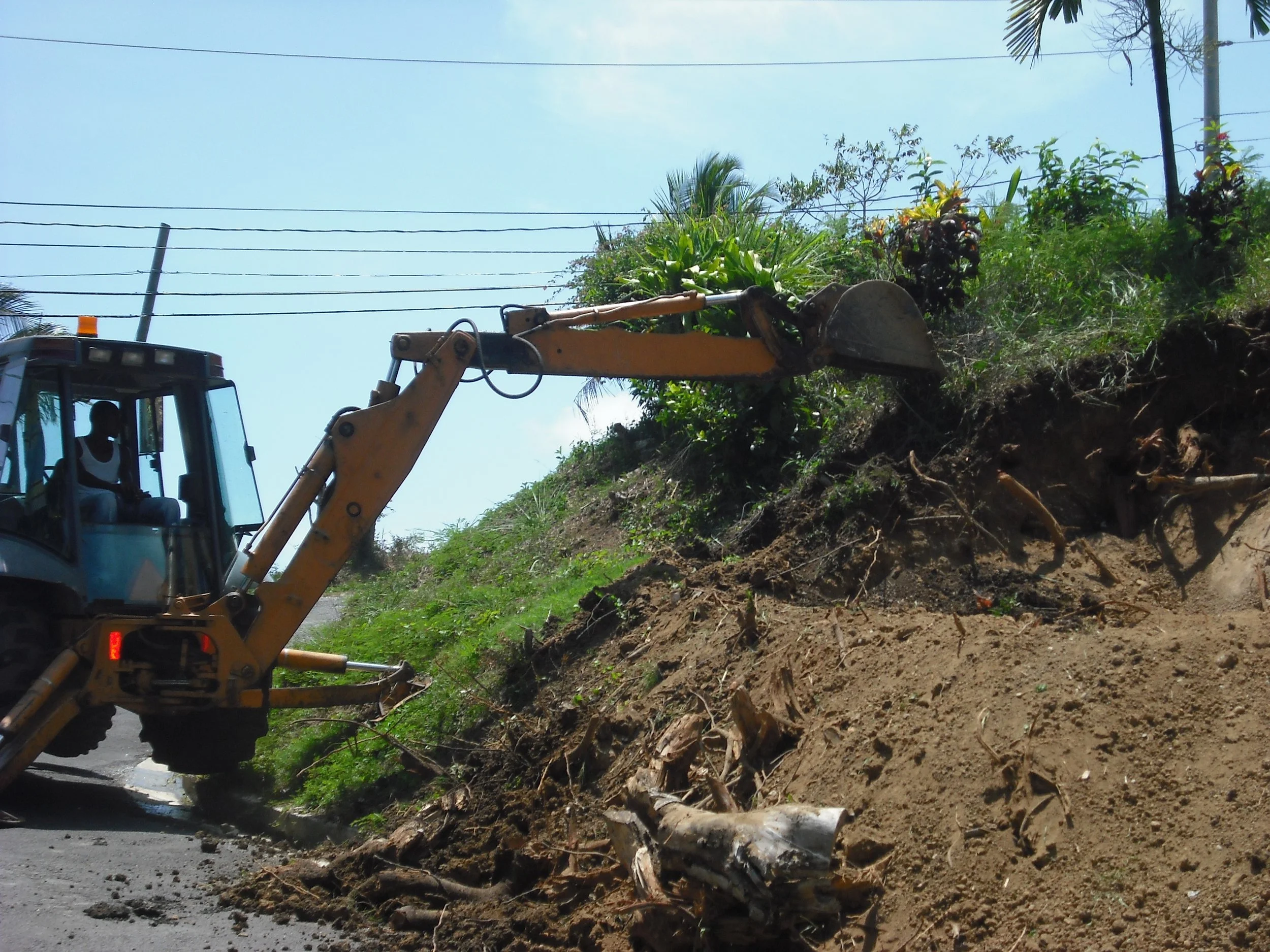 Prepare hillside for retaining stonewall