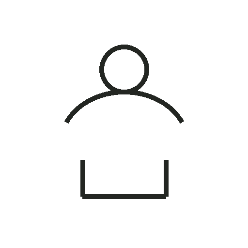 Outline icon of a person sitting at a desk or table.