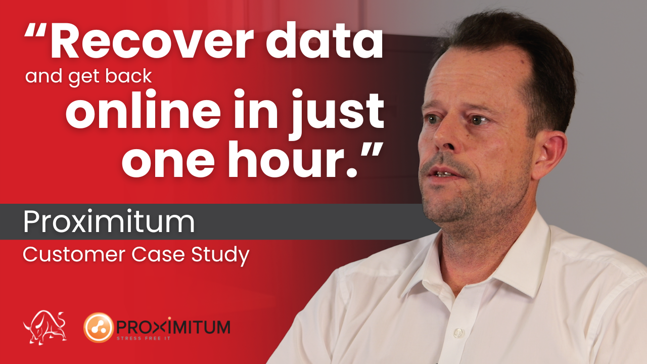 A man in a white shirt sitting and speaking, with a red background displaying the text: 'Recover data and get back online in just one hour.' Proximitum customer case study, with logos of a lion and Proximitum.