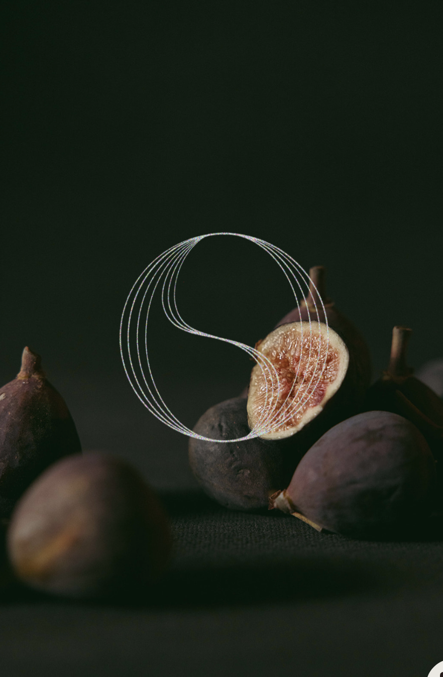 A group of fresh figs, one of which is cut open to reveal the pink interior, with a digital line art artistic swirl overlay on top of the open fig.