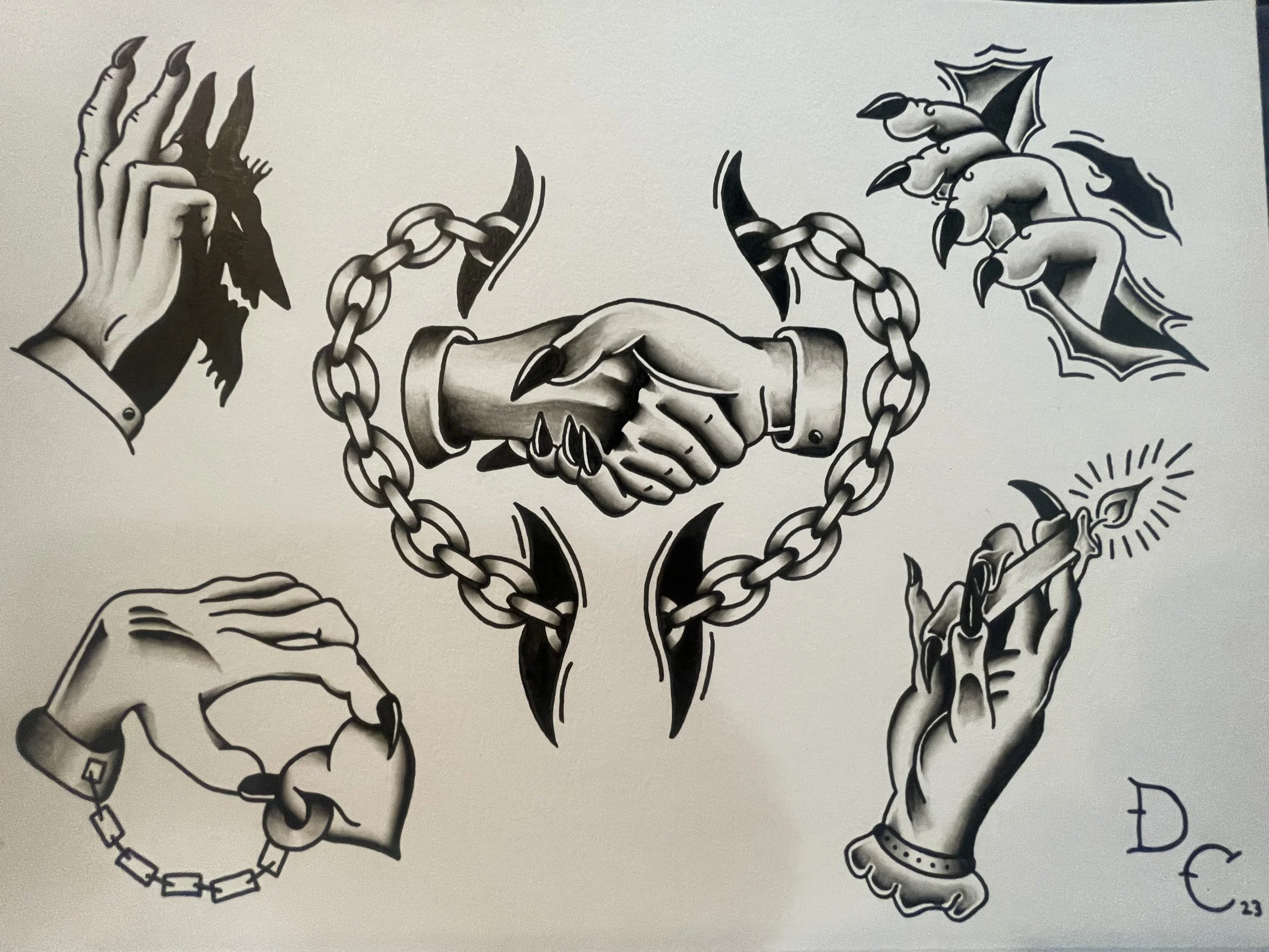 Black and white tattoo art depicting two hands shaking, surrounded by chains and thorny roses, with additional tattoo elements like a sun and letters.