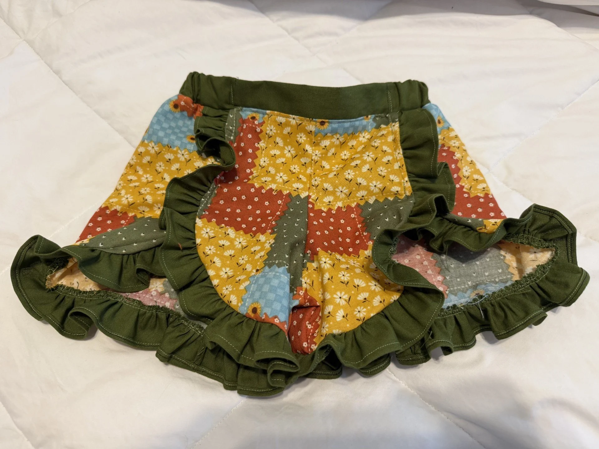 Harmony's ruffled shorts