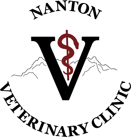 Logo for Nanton Veterinary Clinic featuring mountains, a large letter V, and a caduceus with a dollar sign.
