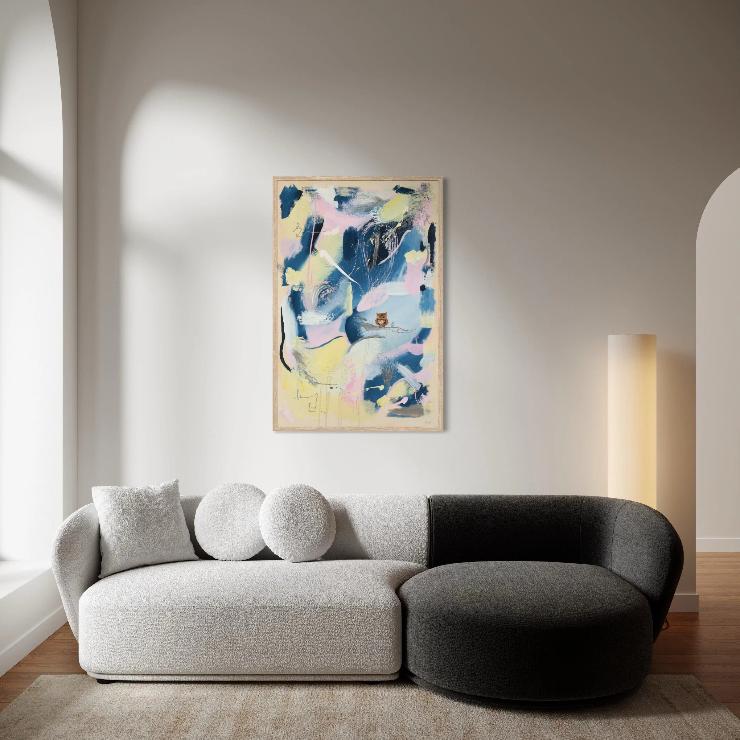 Cotton Candy Sky, limited edition fine art print by Sabrina Richter, framed above a sofa in a living room