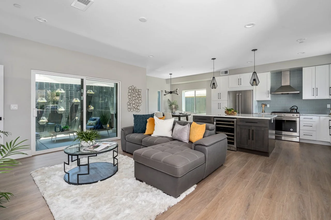 Open-plan living room and kitchen at the Mountain View residence in San Diego