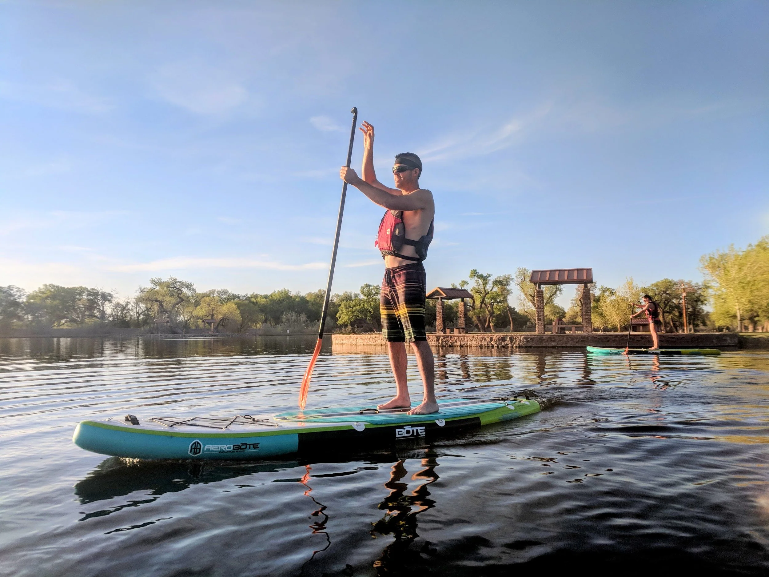 Beginner paddleboarder on a lake