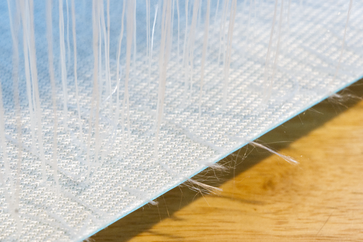close up photo showing a knitted fabric base layer inside an iSUP.