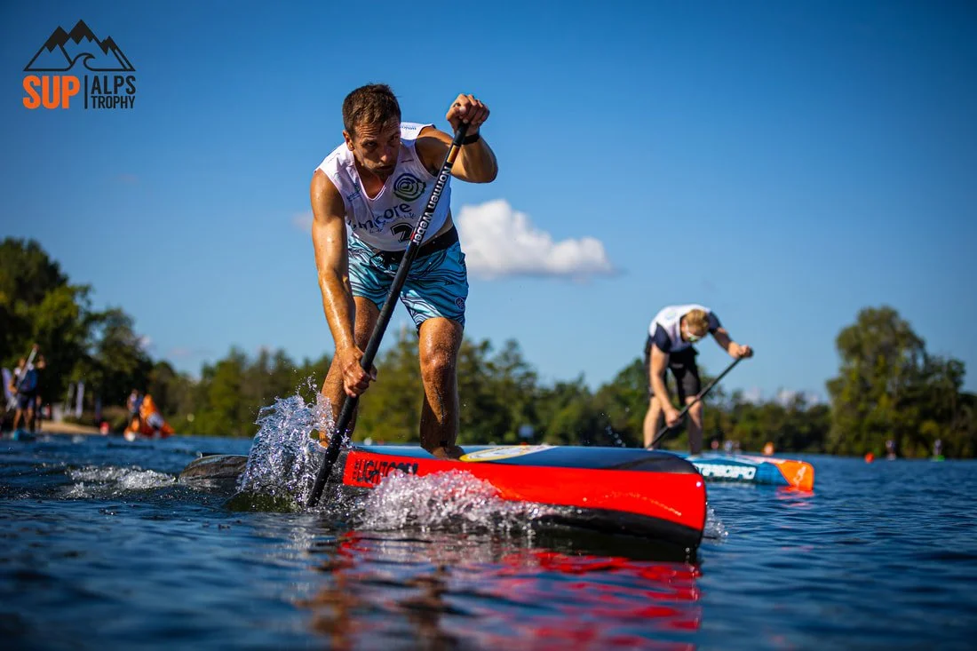Light Board Corp racing SUP nose moving through the water.
