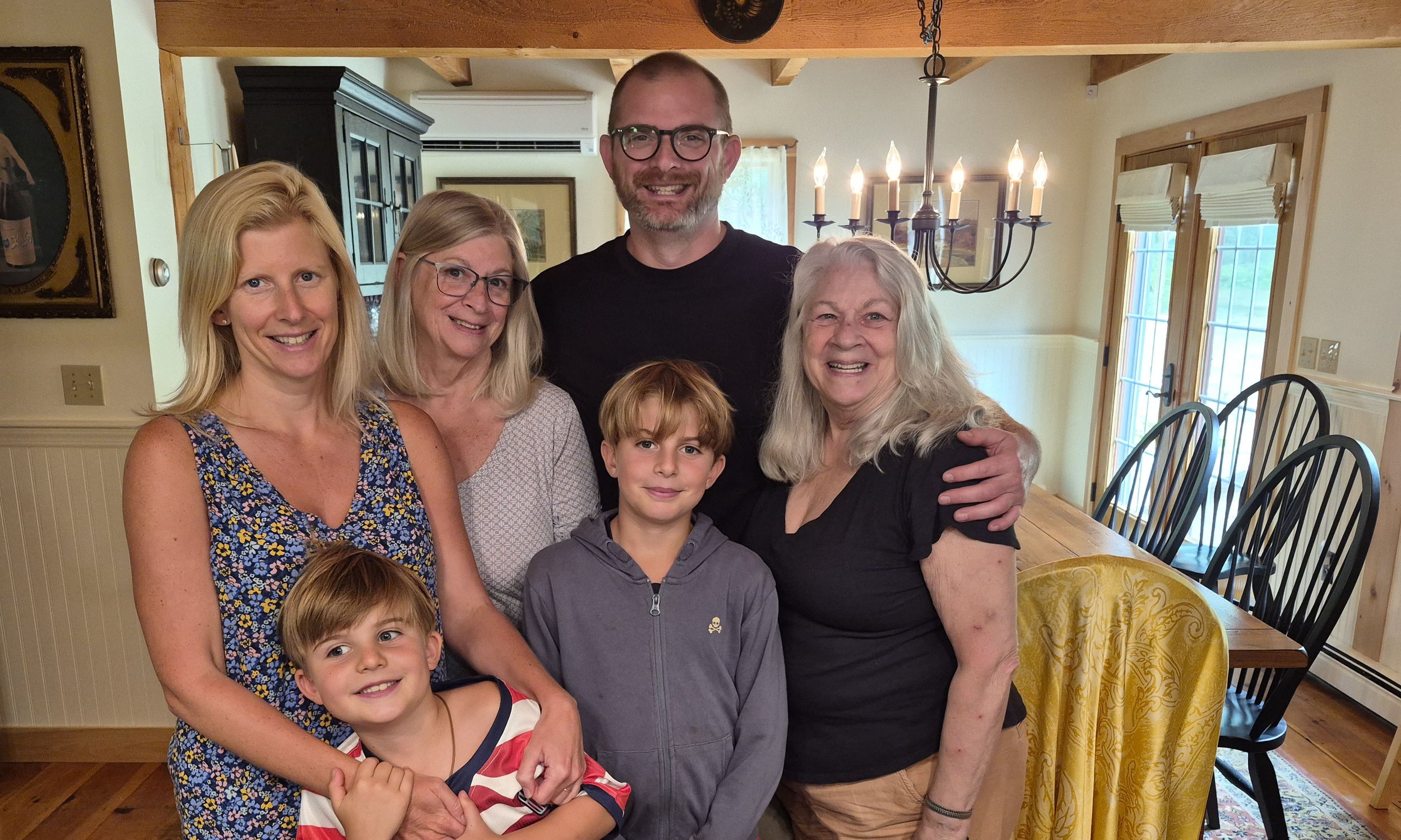 Annie Gehring, Democratic nominee for District 4, Carroll County, NH, with daughter, son, sister, and grandchildren in classic New England home