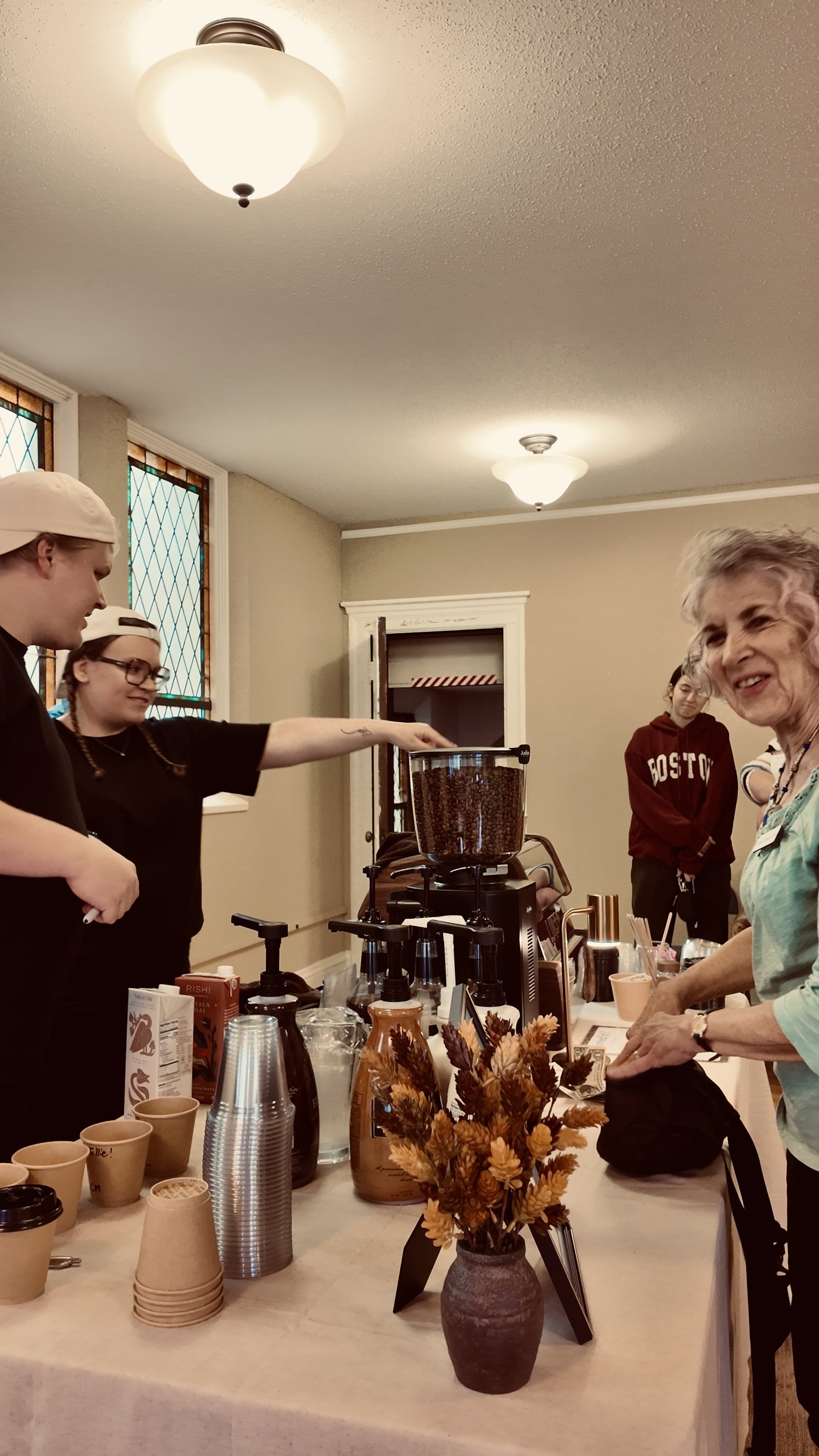Bard & Brew baristas serving guests at a community coffee event at Judson Memorial Baptist Church in Minneapolis.
