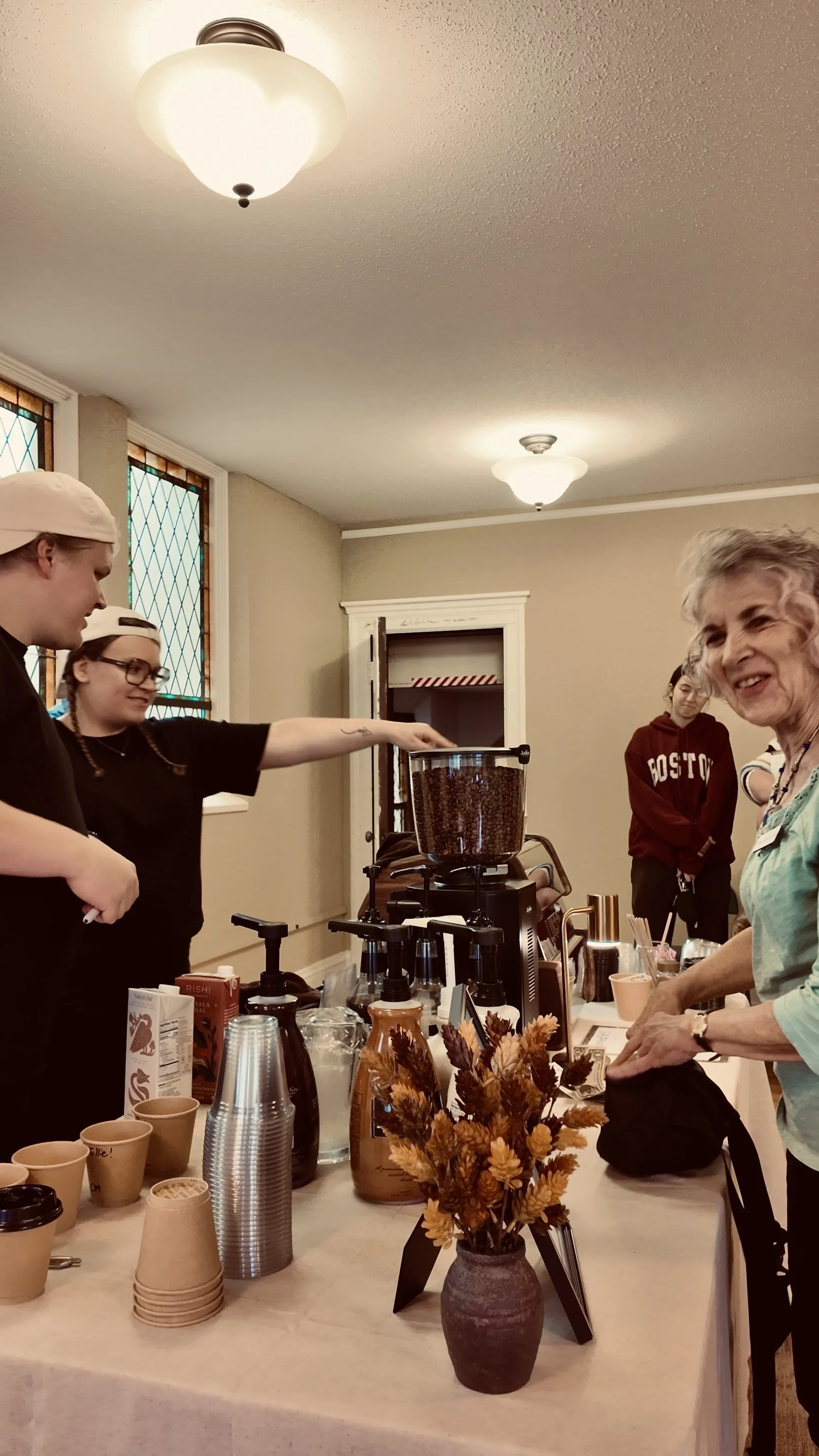 Bard & Brew baristas serving guests at a community coffee event in Minneapolis.